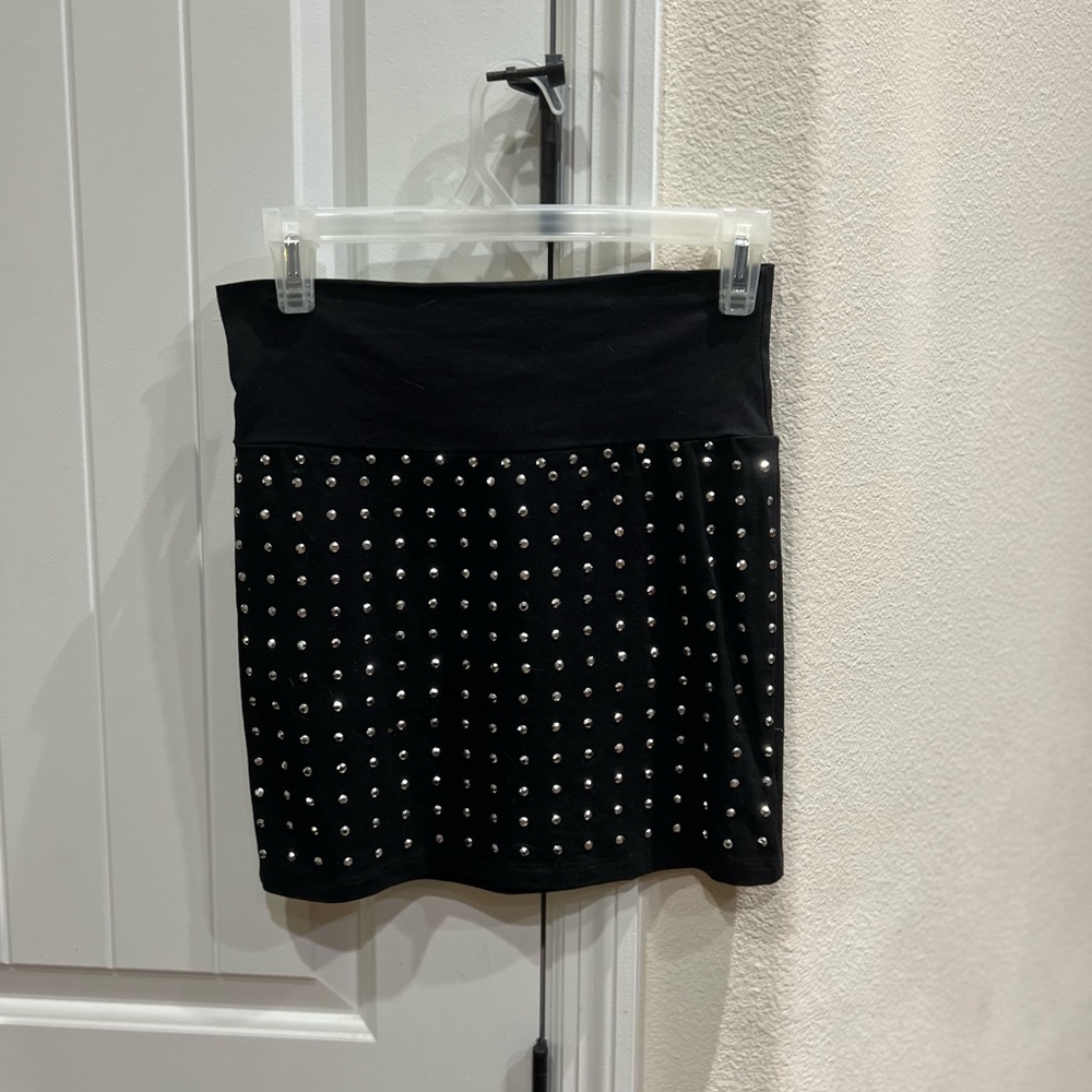 Women’s black stretch skirt with silver studs